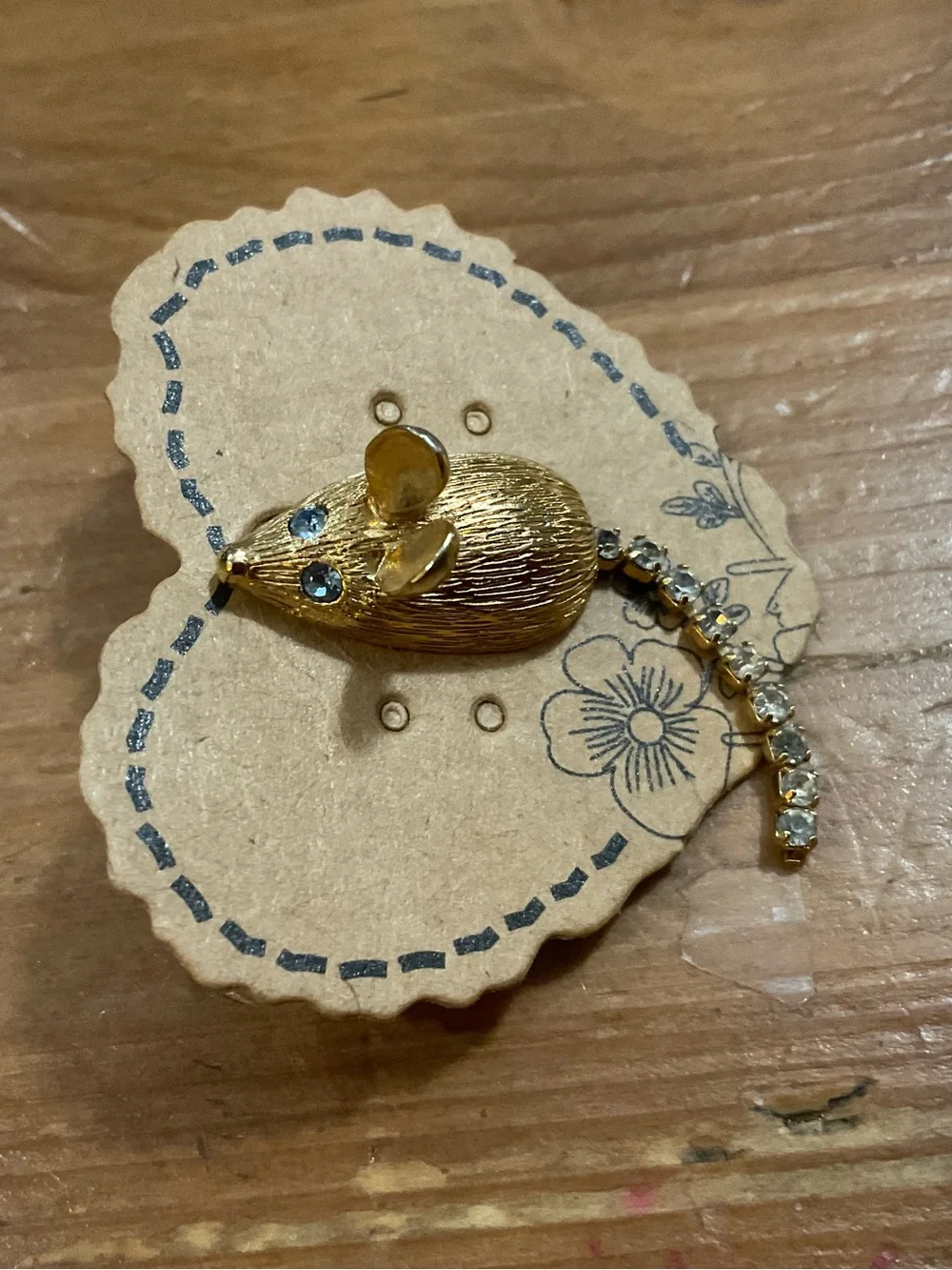 Avon:vintage gold tone/plated Midas the mouse with blue eyes tie tack/pin/brouch